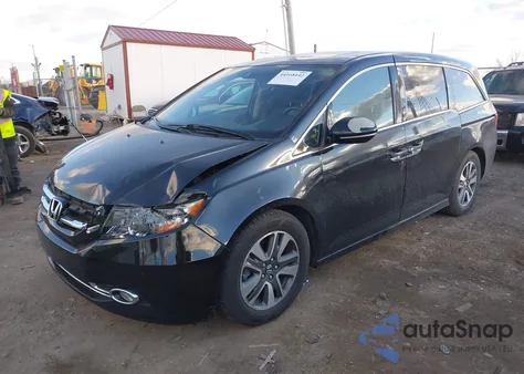 2014 Honda Odyssey Touring/Touring Elite z USA, uszkodzony, nr VIN 5FNRL5H93EB035445